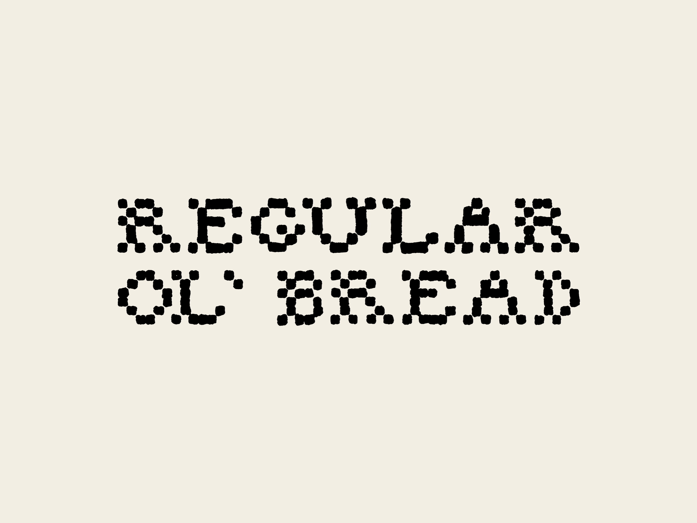 Regular Ol' Bread in two lines of stitched, cross-stitch-style capitals, black on cream.