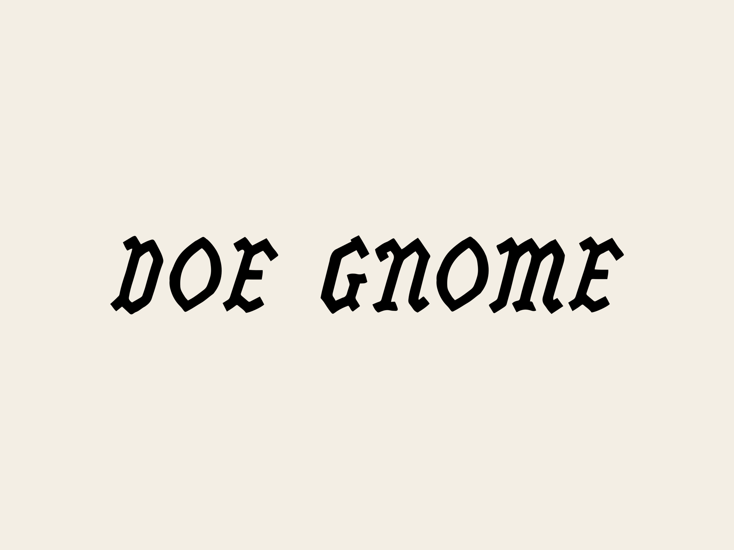 The Doe Gnome wordmark in blackletter, black on cream.